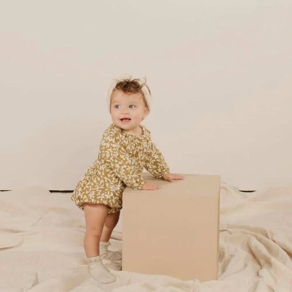 Rylee + Cru Tan and White Floral Kids bubble romper. 6 to 12 months